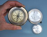 Desk Compass with Magnifier Magnifying a Coin